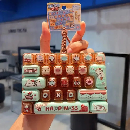 In Stock ///26Grid Keycap Clicker Anti Stress Fidget Keyboard Keychain